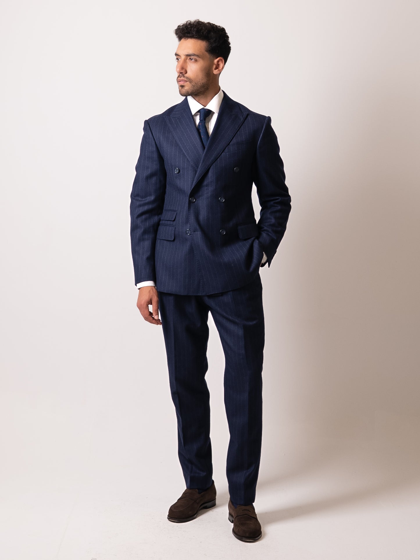 Chalk stripe Gurkha trousers styled as part of a full double-breasted suit.