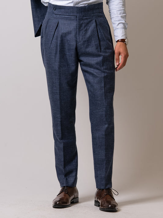 Front view of the light blue linen-wool trousers
