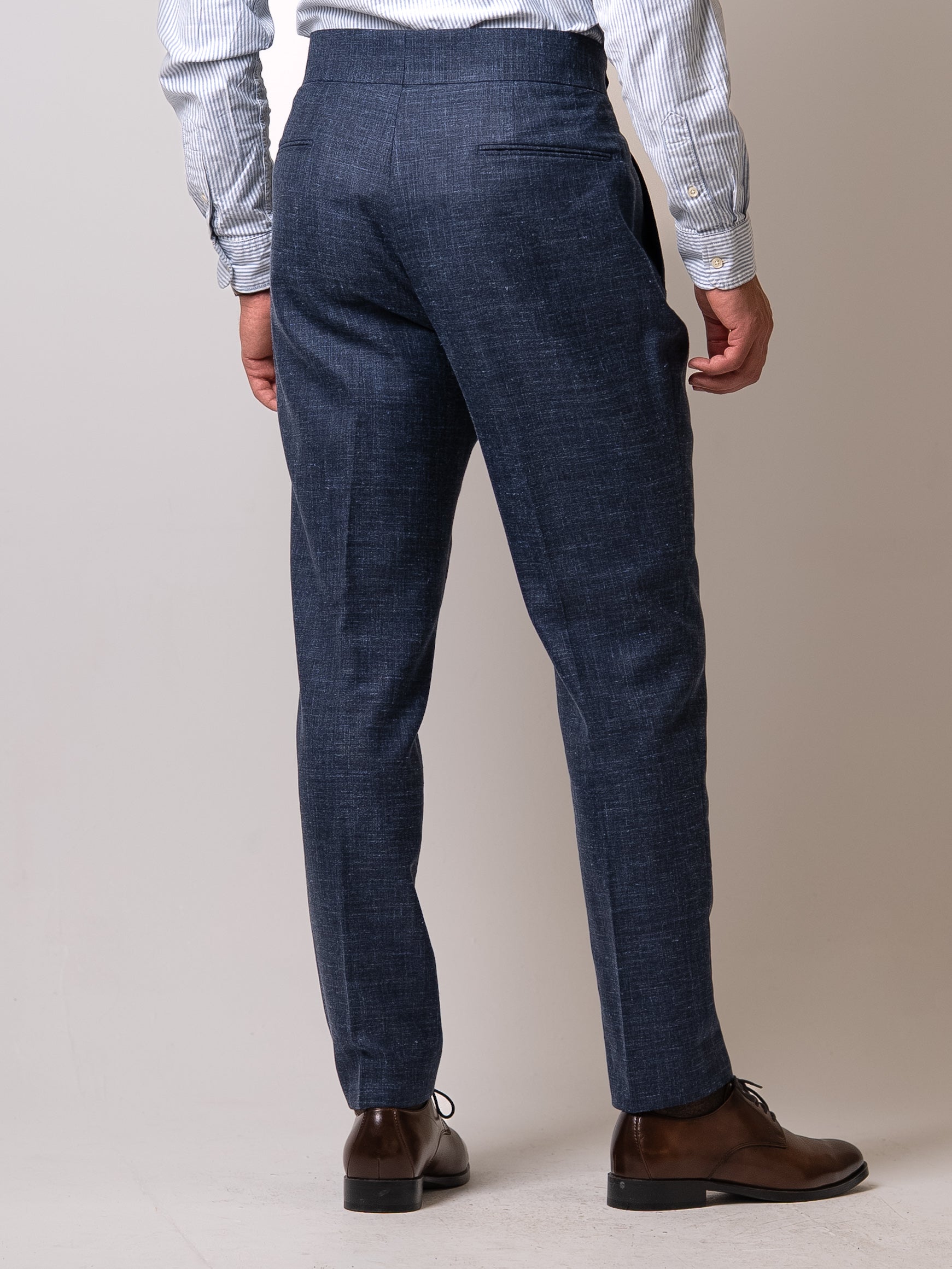 Back view of light blue linen-wool trousers